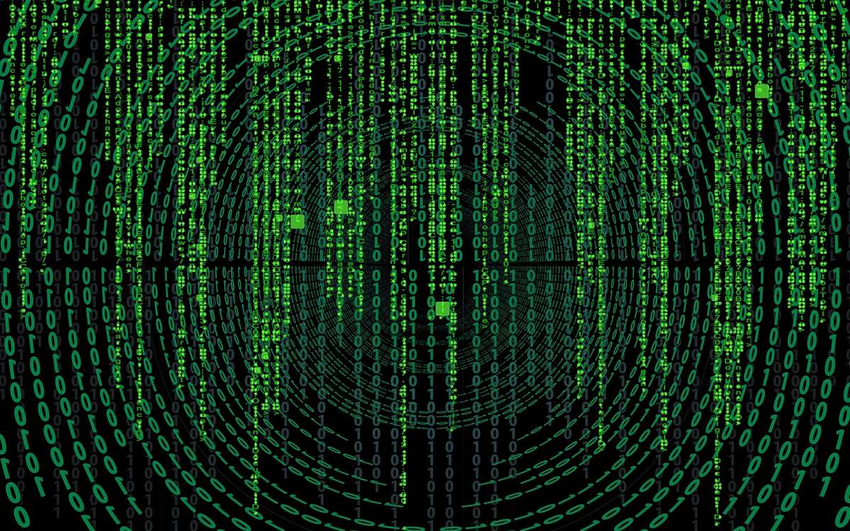 Caracteres verdes cayendo por una pantalla oscura, al estilo Matrix